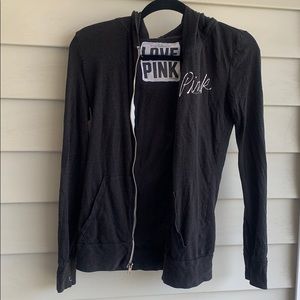 Pink zip up hoodie. Black size small